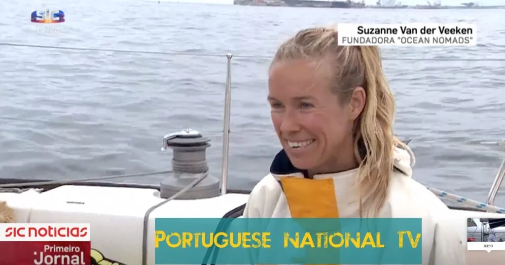 A sailing crew on a sailboat with the words Portuguese national TV.