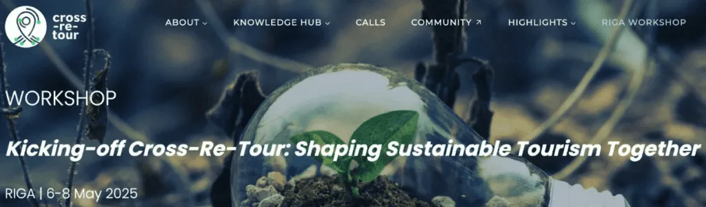 A small plant grows inside a clear light bulb lying on soil, symbolizing sustainable tourism for the Cross-Re-Tour Workshop in Riga, May 2025—a vision also shared by Ocean Nomads.